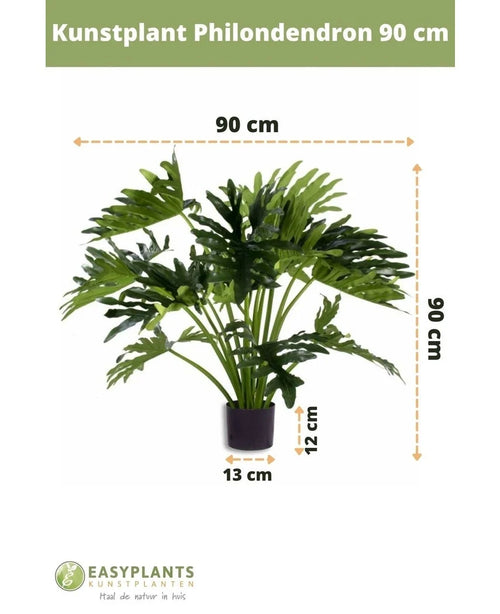 Konstgjord växt Philodendron UV 90 cm i svart kruka, med 90 cm breda blad. Perfekt för alla utrymmen. Krukstorlek: 12 cm hög, 13 cm bred. Easyplants logotyp längst ner.