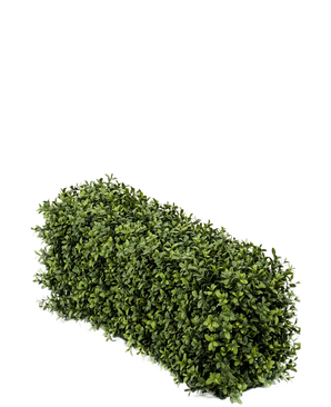 Artificiell buxbomshäck UV 70x20x25 cm är en tät, rektangulär konstgjord buxbomsbuske med små gröna blad mot en vanlig vit bakgrund.